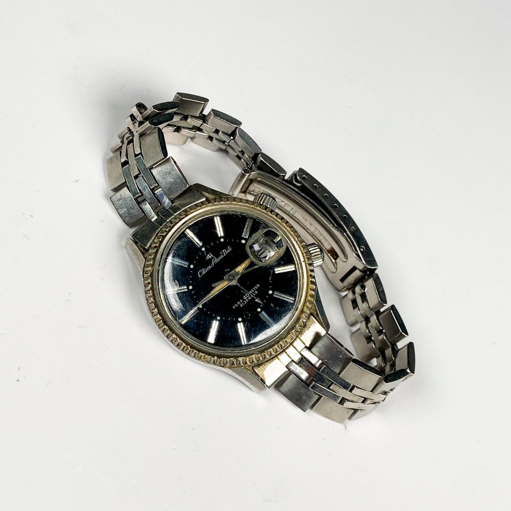 Lote siguiente: Reloj pulsera Citizen Alarm Date con malla metal
