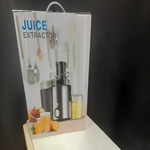 Lote siguiente: Extractor de Jugo Eléctrico