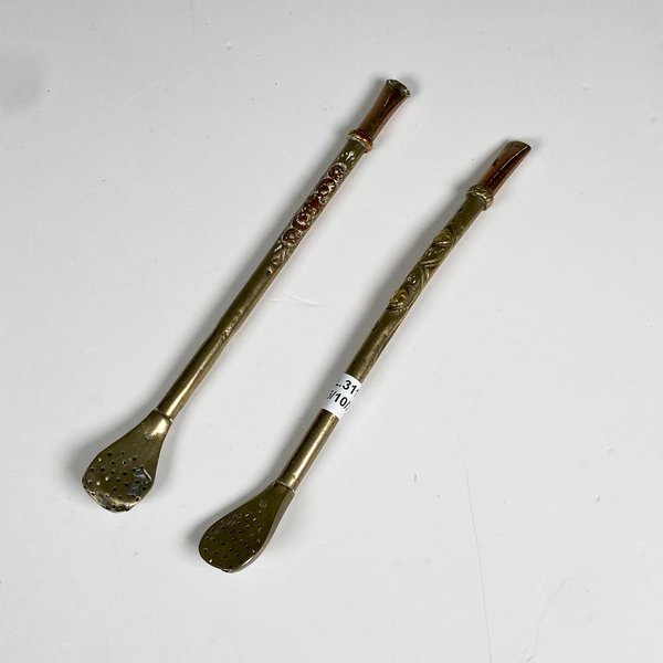 Dos bombillas de plata y oro, paletas averías