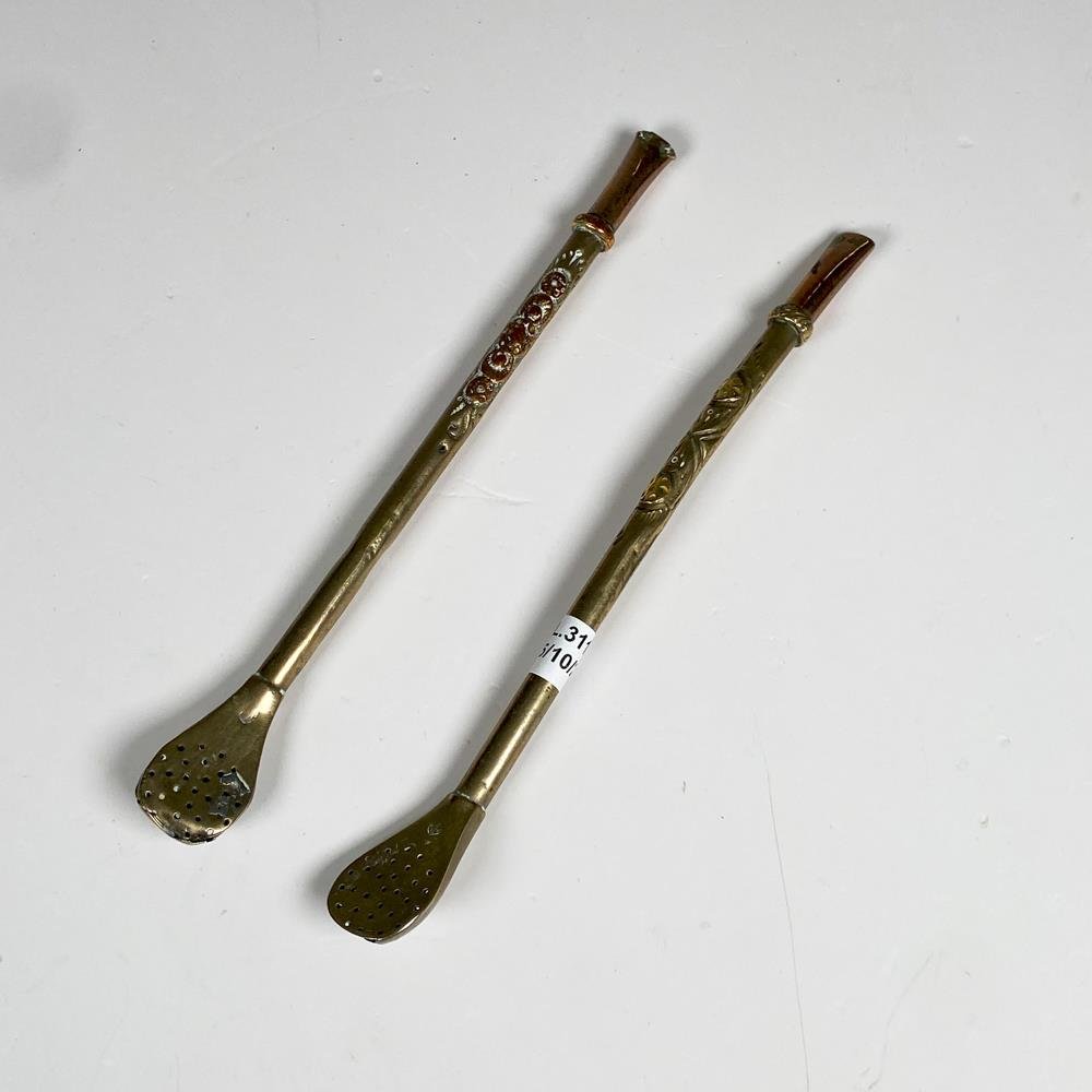 Dos bombillas de plata y oro, paletas averías