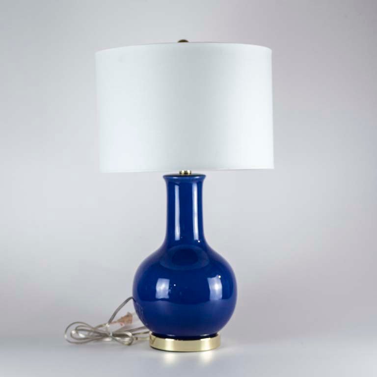 Lámpara de mesa de una luz en cerámica azul con base dorada - imagen 1