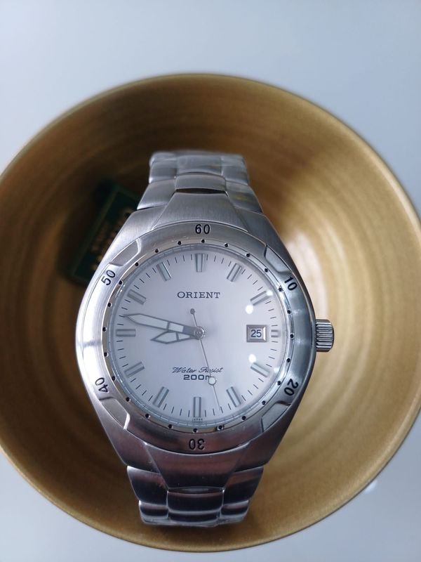 Reloj Orient Acero Inoxidable Bisel Unidireccional Esfera Blanca 42mm