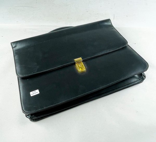Lote anterior: Maletín de cuero negro con accesorios