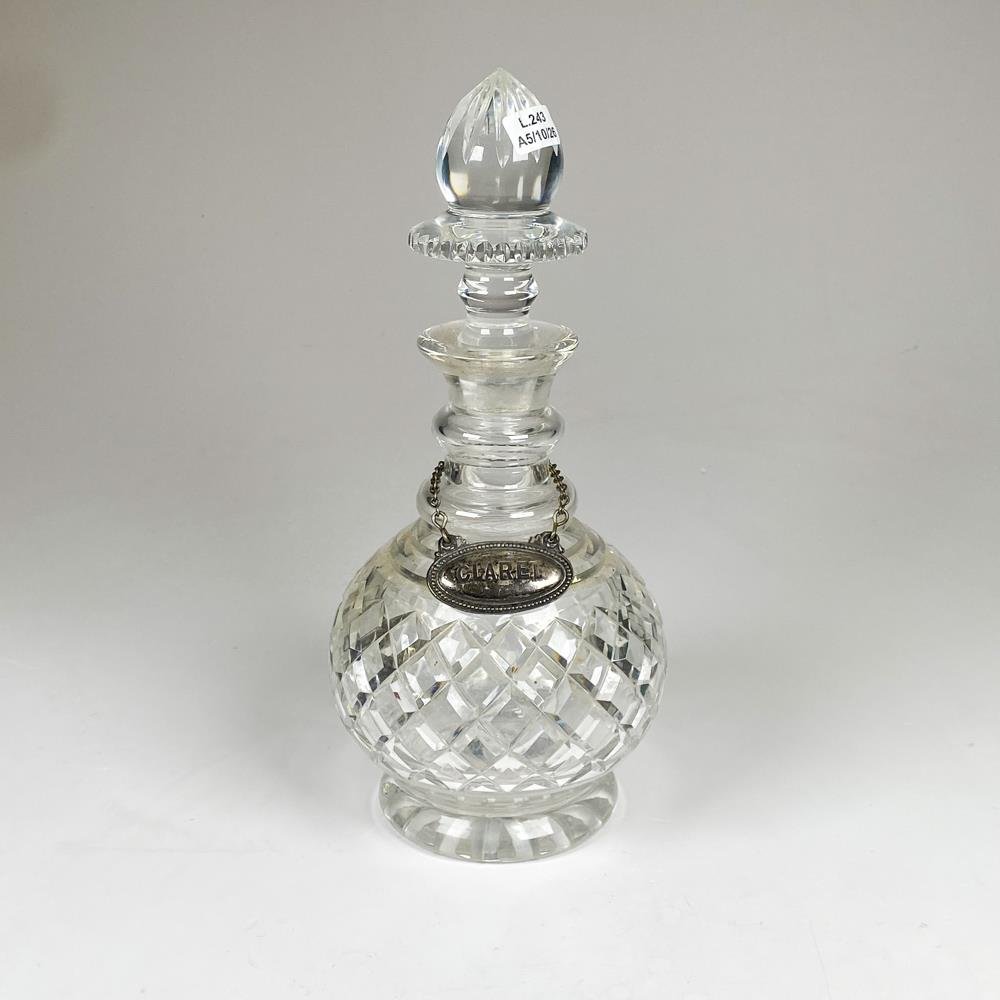 Botellon de cristal tallado hialino ,con cartela y tapón (borde adentro chips) altura 31 cm