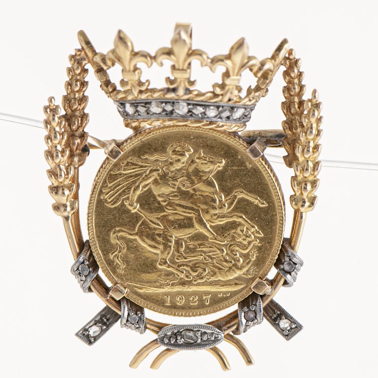 Lote siguiente: Prendedor de oro con Libra y brillantes