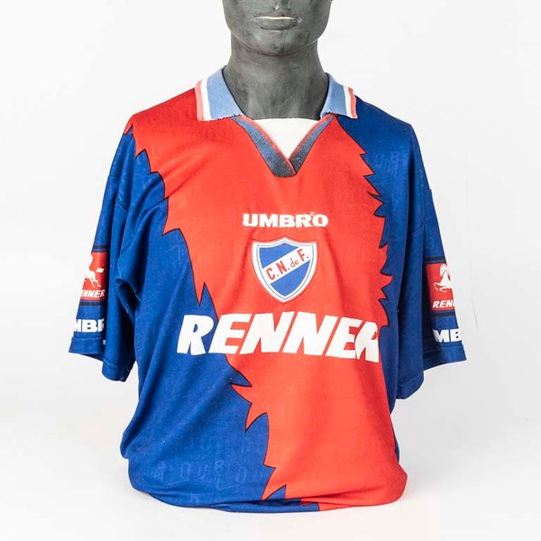 Lote anterior: Camiseta de Nacional oficial de tienda marca UMBRO sin número segunda equipación de los años 1995/96