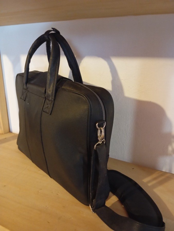 Lote anterior: Bolso Johonnie Walker en impecable estado, sin uso.
