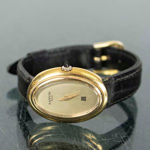Lote siguiente: Reloj de Dama Lanvin Paris Dorado con Malla de Cuero