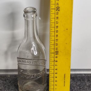 Lote anterior: Botella Antigua de Vidrio "Arizona" con Teléfono Grabado