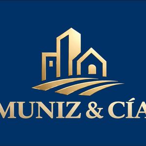 Logo de Muniz & Cía
